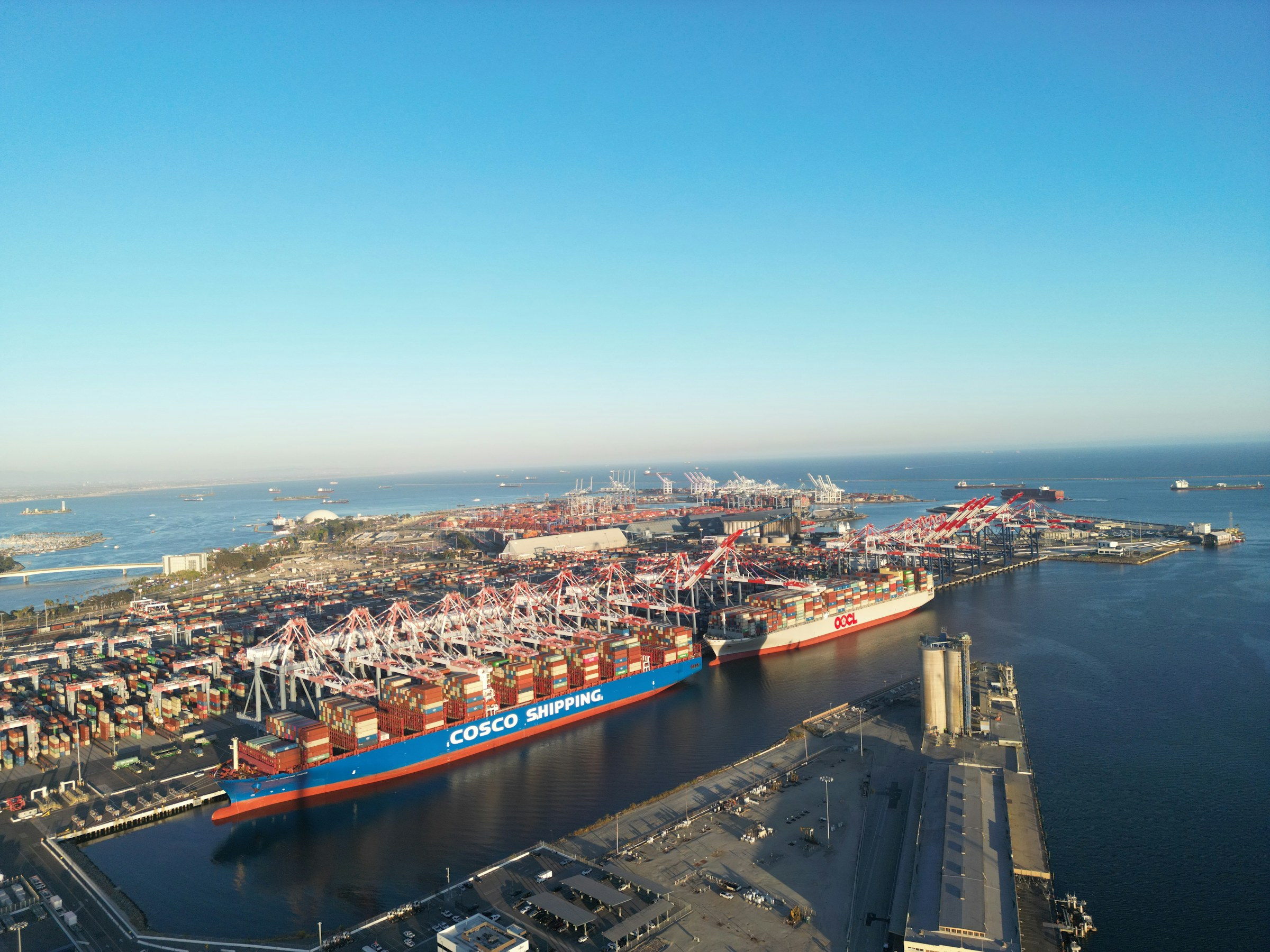 Aerial view of a container vessel berthed at a working port